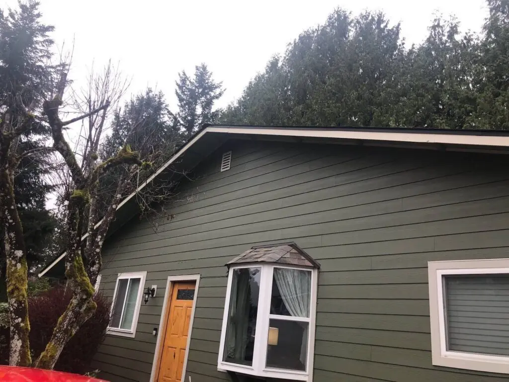 Mismatched fascia and soffits beside newly installed siding on Maple Valley WA home